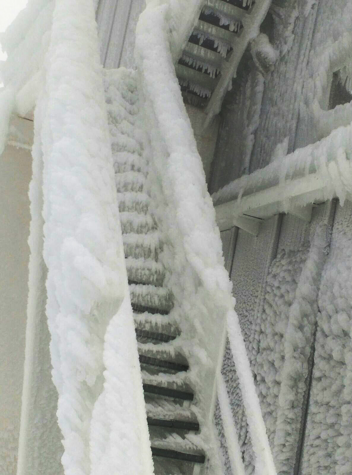 Staircase covered in thick ice