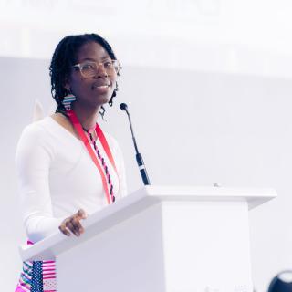 Picture of Joyful Mhdluli giving a talk 