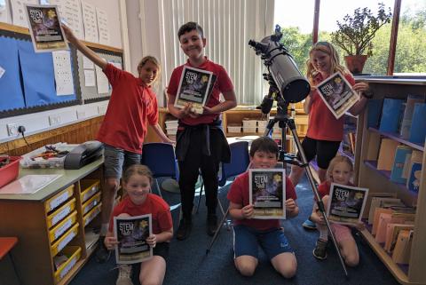 AfRIS Pupils proudly showing their Gold Certificates.