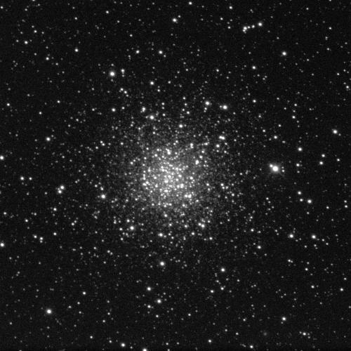 Lots of stars against a black background. Each star is a white dot of varying sizes. Though some are scattered around the edges of the image, most are concentrated in the centre which glows brightly as a result.