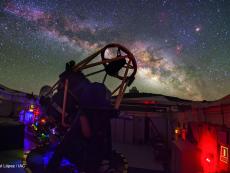 The Liverpool Telescope shown at night with the milky way in the sky above it